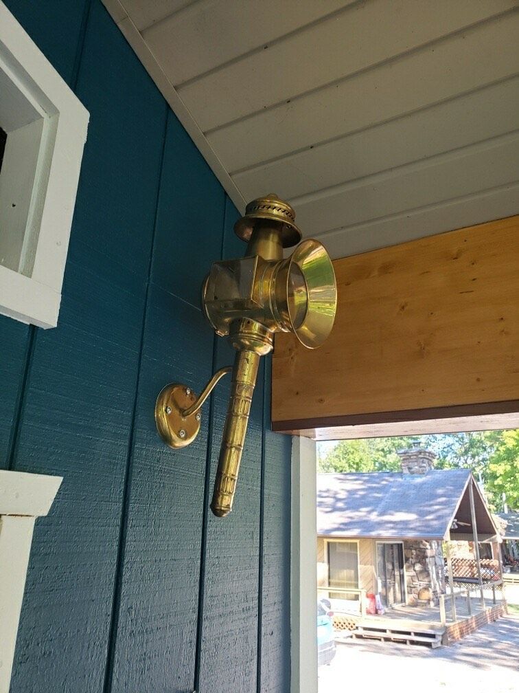 Vintage lantern detail on the cabin porch