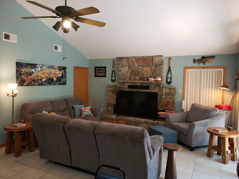 Comfortable living room with stone fireplace